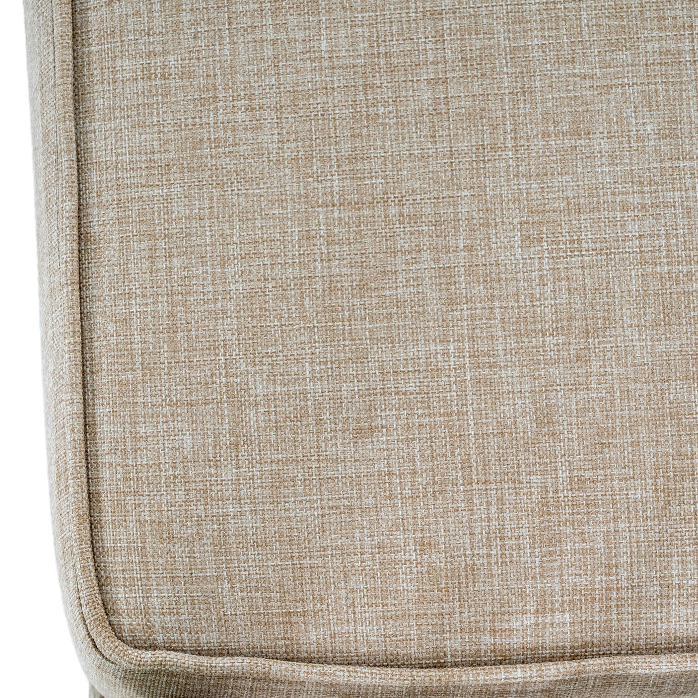 Close-up of a textured beige fabric surface