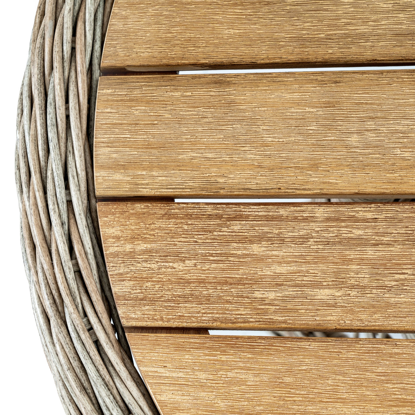 Close-up of a wooden bistro table with woven edge on a white background