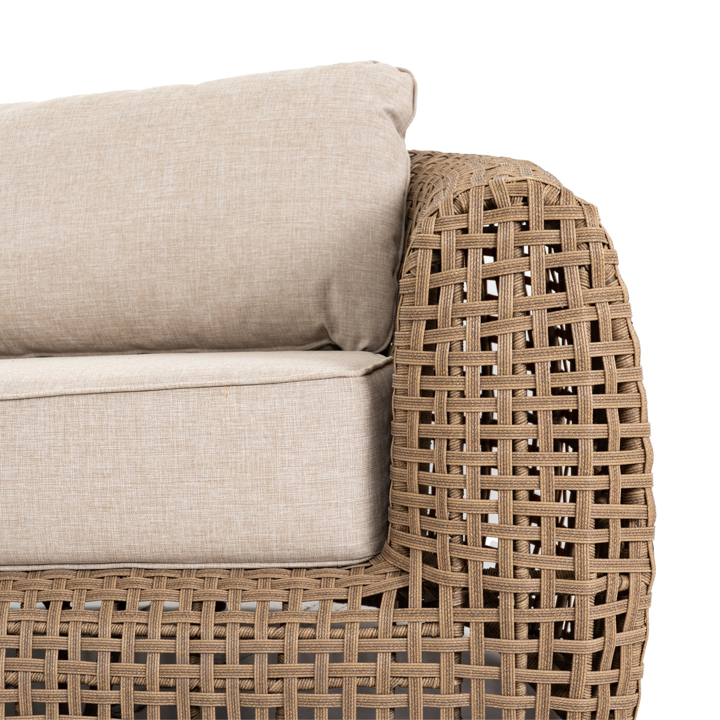 Wicker sofa with beige cushions on a white background
