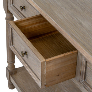 Wooden drawer of a piece of furniture with a light finish.