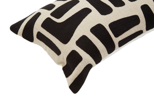 Rectangular Elora Natural And Black Embroidered Cushion shown at an angle