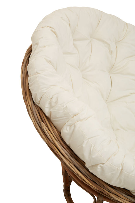 Close up of Marano round rattan chair with cream cushion