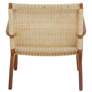 Back view of a cream woven rattan armchair.