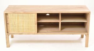 Wooden TV stand with wicker door on a white background