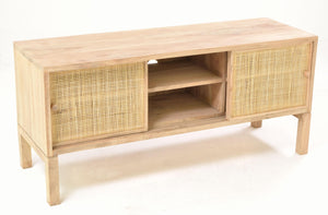 Wooden TV stand with wicker doors on a white background