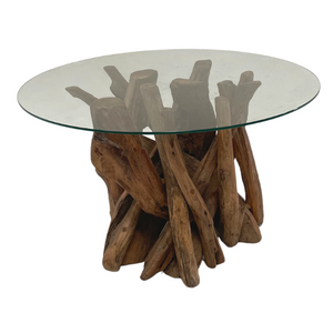 Glass-top table with teak root base on a white background