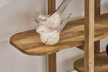 Close up of an open shelving unit with decorative stone birds