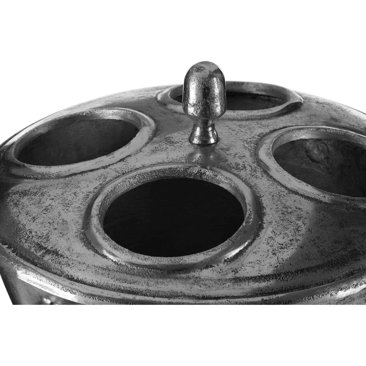 Close-up of the four bottle openings in the Sterling wine cooler lid