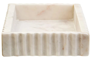 End view of the Vela White Marble Fluted Rectangular Tray, showing the inside of the tray and its pale veining.