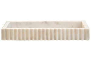 Side view of the Vela white marble tray, showing the evenly spaced fluting along its length.
