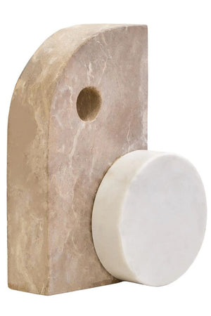 Ossa Chocolate and White Marble Abstract Sculpture, an abstract chocolate and white marble sculpture with a circular opening, on a white marble disc base.
