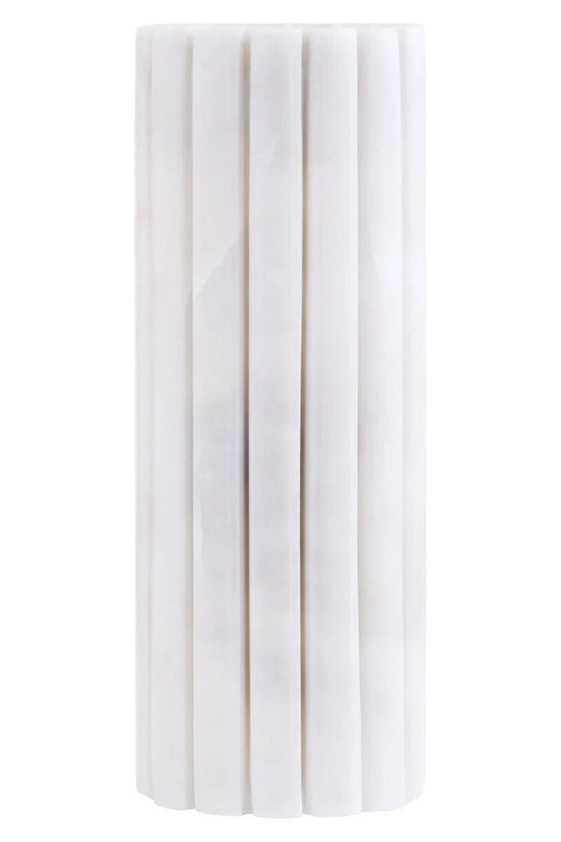 Vela White Marble Fluted Bud Vase, showing the natural veining of the marble.