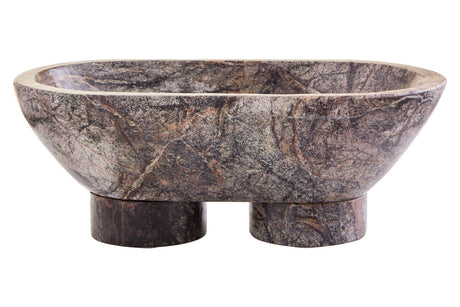 Side view of the Cairn marble pedestal bowl, showing its two chunky cylindrical feet and rich green-grey veining.