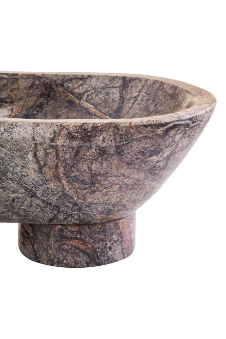 Close view of the end of the Cairn marble bowl, showing the curve of the bowl and polished foot.