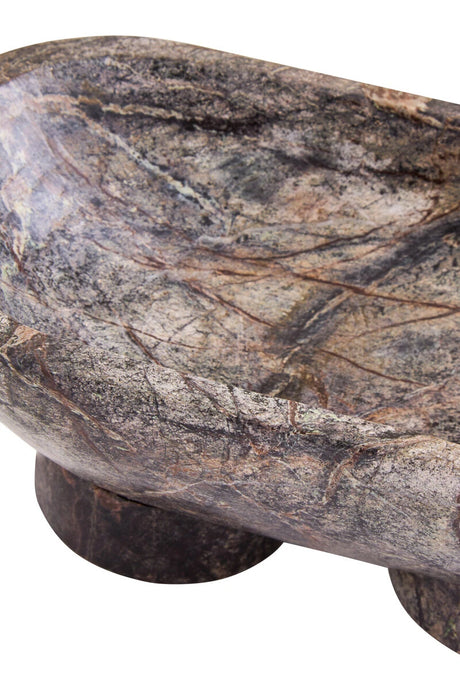 Close-up of the Cairn marble pedestal bowl, showing the plum, rust and green tones of the natural stone.