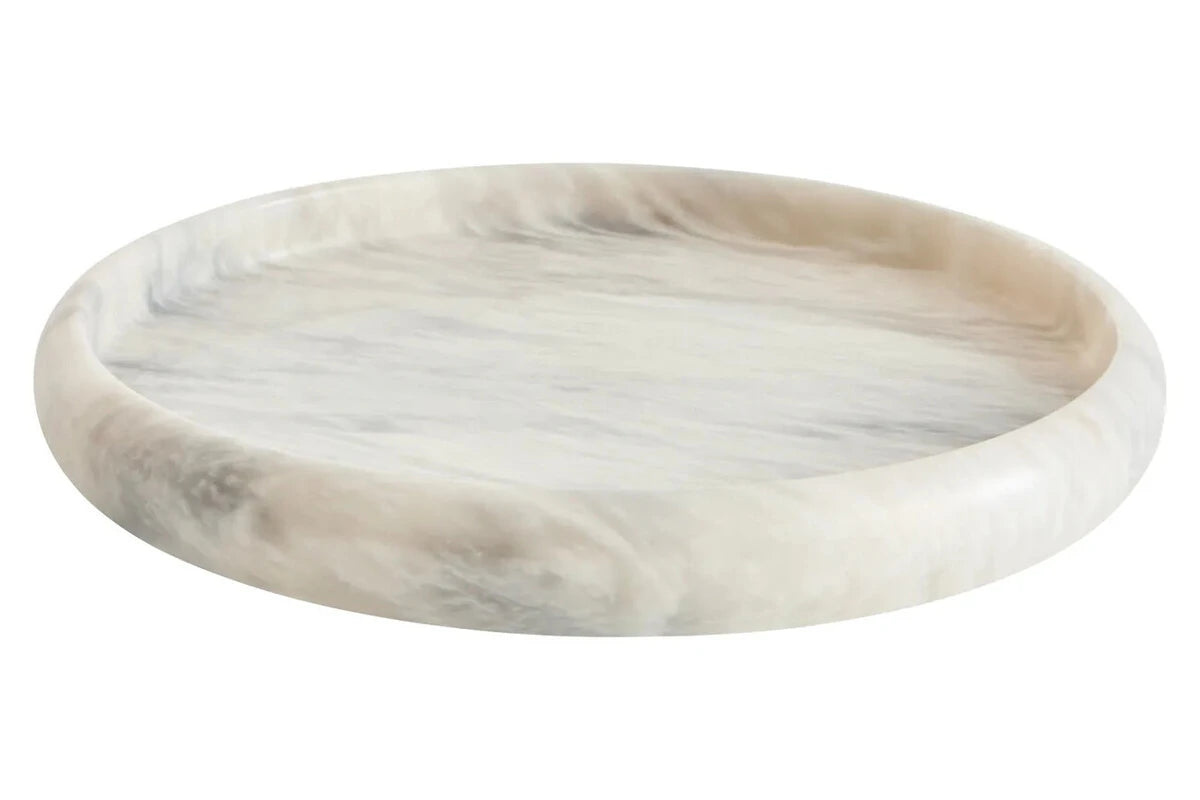 Alba White Marble Round Tray, a round white marble tray with raised edges and delicate natural veining.