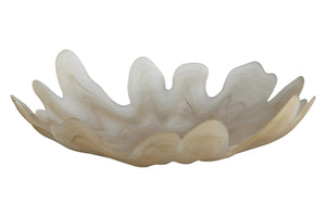 A sculptural, organic-shaped glass bowl with wavy, petal-like edges in a translucent off-white and cream color, shown against a plain white background.
