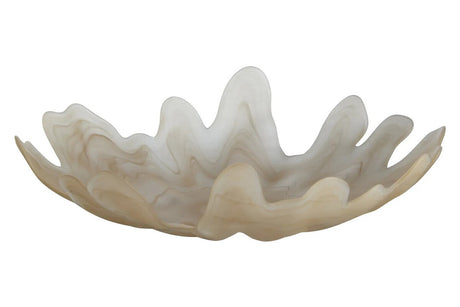 A sculptural, wavy-edge bowl made of translucent glass in a warm cream and beige marbled colour, isolated on a white background.