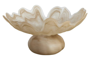 Decorative shell-shaped bowl on a white background