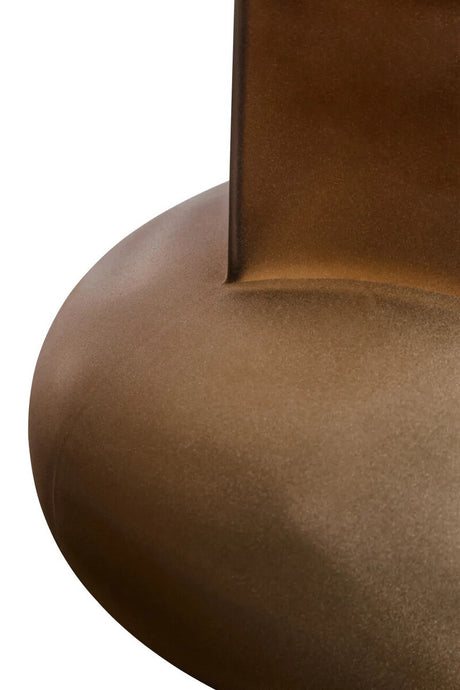 Close-up of a round brown glass vase with a white background