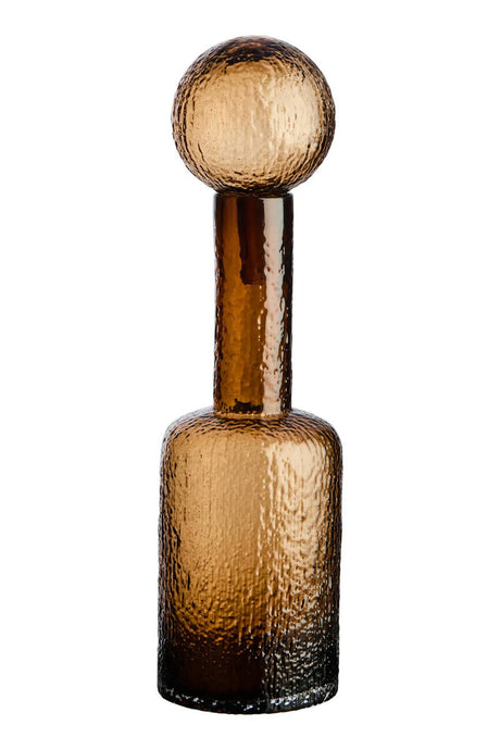Brown glass bottle with a spherical cap on a white background