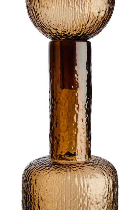 Brown glass vase with textured surface on a white background