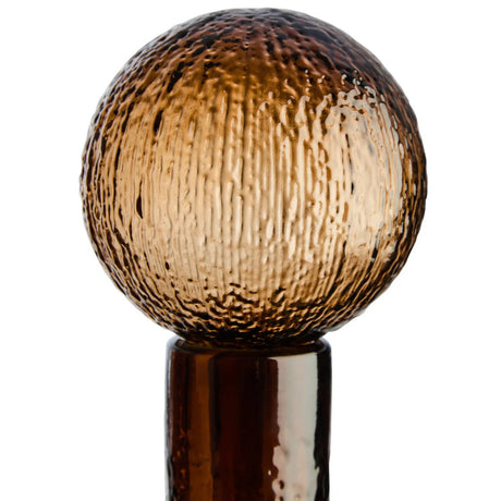 Decorative sphere with a textured surface on a white background