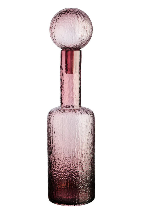 Pink glass bottle with a spherical cap on a white background