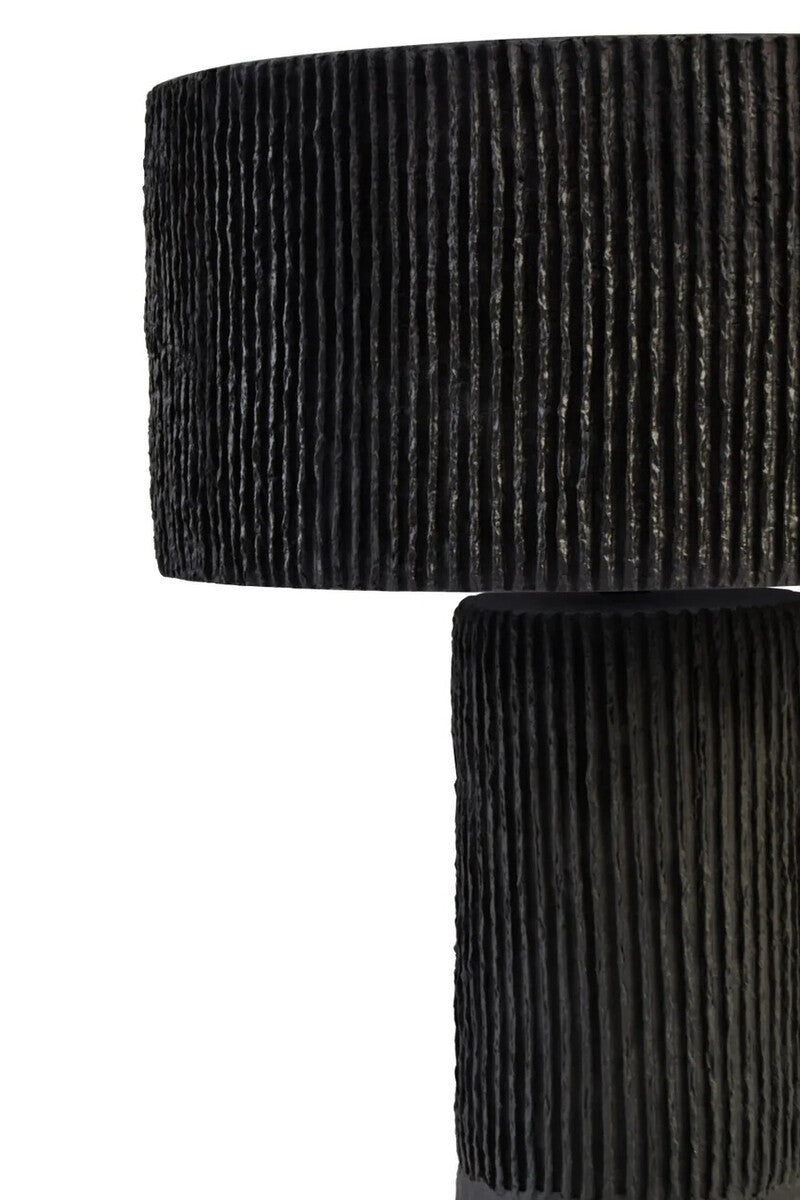 The Luma black table lamp on a white background