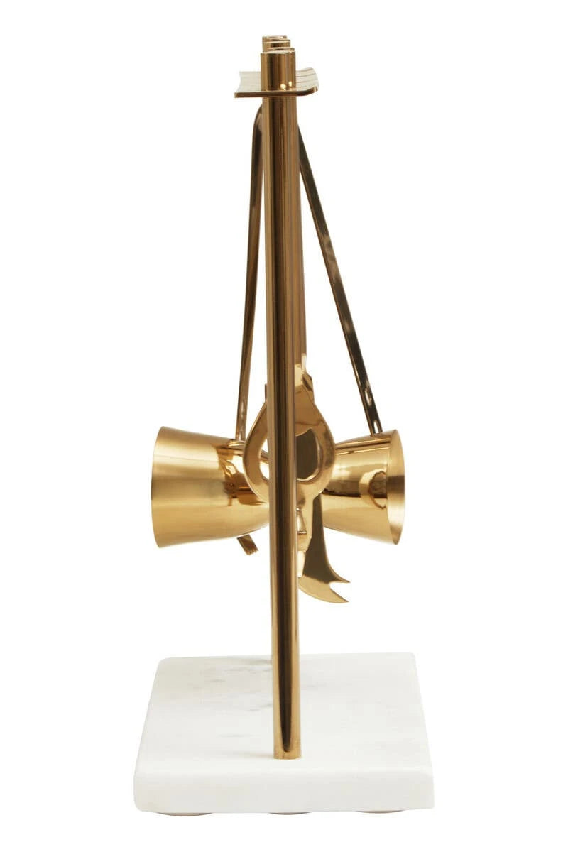 Side view of the Loxley marble and gold finish bar tool stand