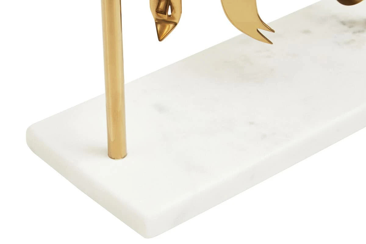 Close-up of the white marble base on the Loxley bar tool stand