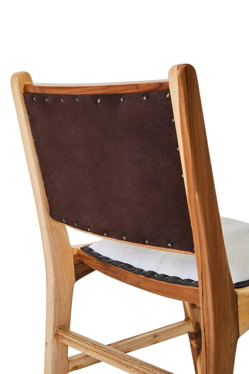 Back view of the Jakarta Dining Chair, showing the dark brown leather back panel with studs in the teak frame.