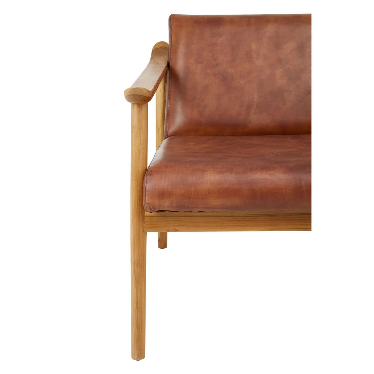 Close-up of the brown leather seat and the upturned teak arm of the Jakarta Natural Teak Armchair.