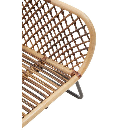 Close-up of a wicker chair with a metal frame on a white background