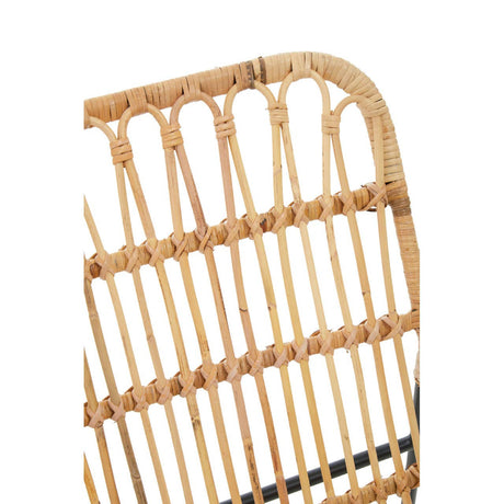 Close-up of a wicker chair backrest on a white background