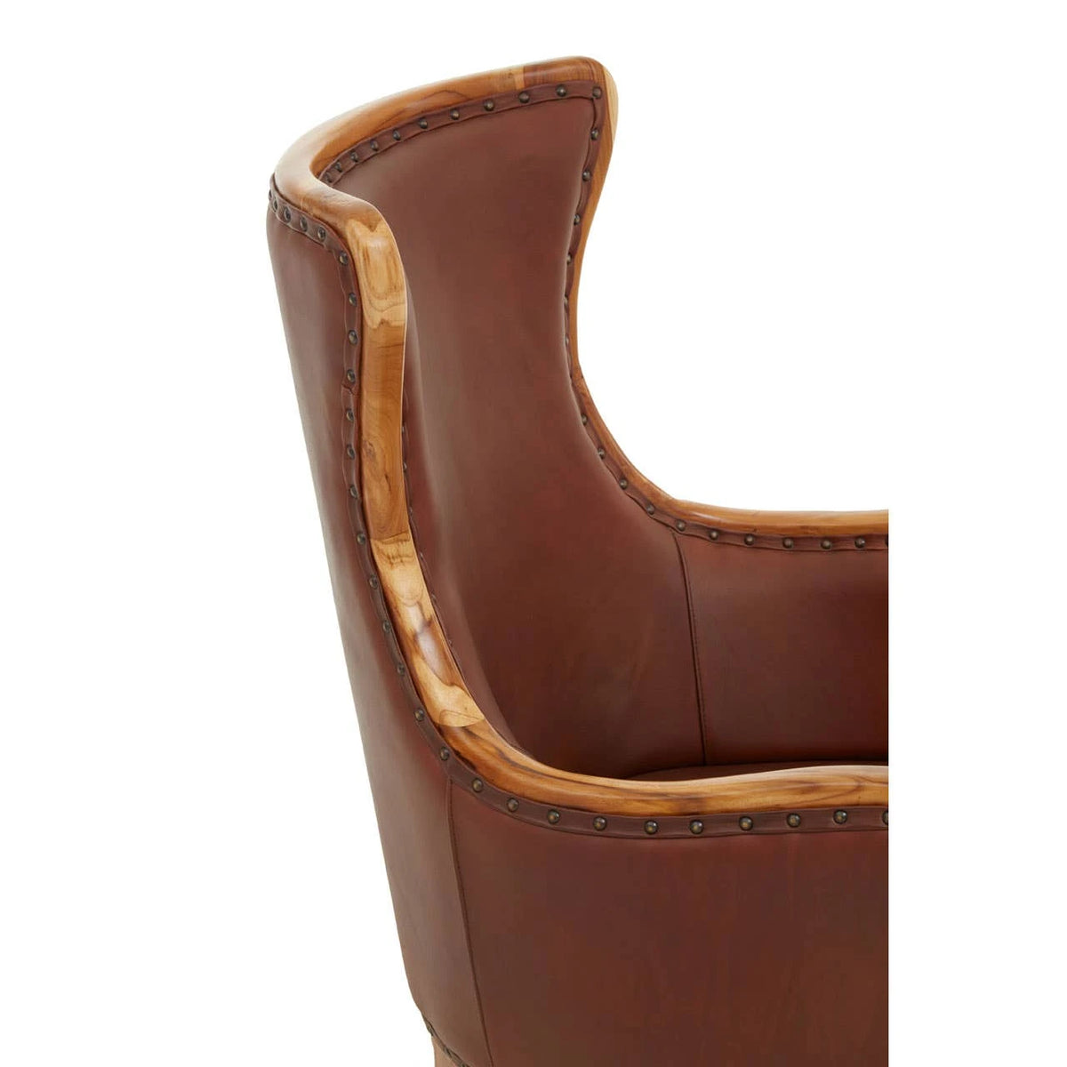Close view of the curved wing of the Jakarta Studded Chair, showing the teak edging and antique studs.