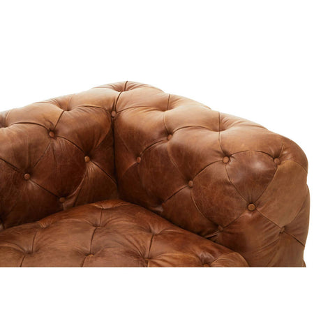 Close up of corner of Durango brown leather chesterfield sofa right arm