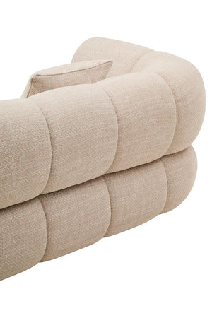 Cream linen sofa on a white background