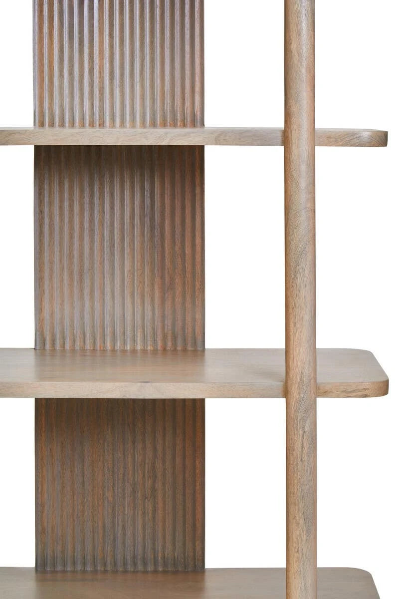 Close view of the Hawthorn Grey shelf unit, showing rounded shelves, a round post and the reeded centre panel.