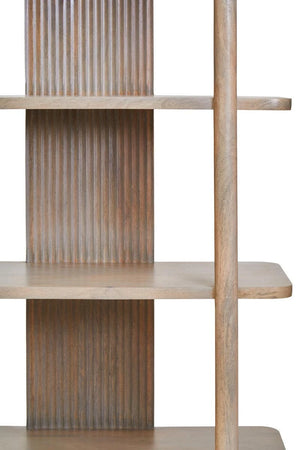 Close view of the Hawthorn Grey shelf unit, showing rounded shelves, a round post and the reeded centre panel.