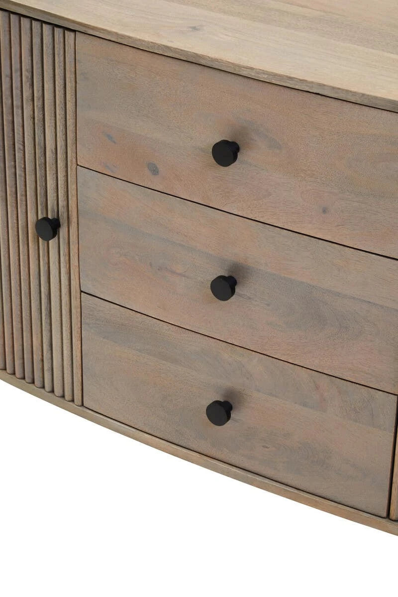 Close-up of the three drawers of the Hawthorn Grey Oval Sideboard with round black knobs.