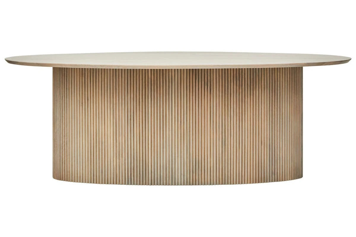 Side view of the Hawthorn Grey Oval Dining Table, showing the long oval top above a reeded oval base.