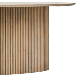 Close view of the Hawthorn Grey dining table's reeded base beneath the edge of the oval top.