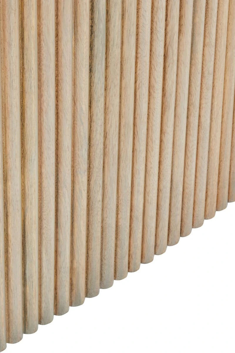 Close-up of the vertical reeding on the Hawthorn Grey Oval Dining Table base, showing the grey-washed mango wood grain.
