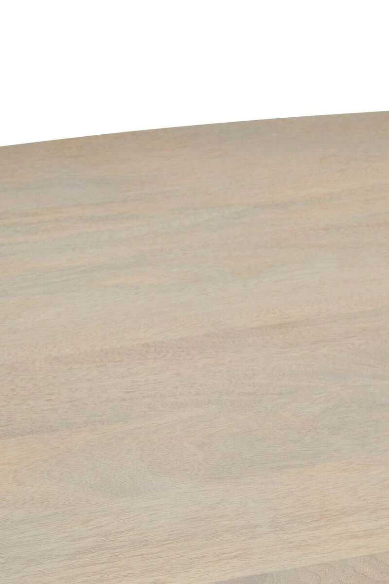 Close-up of the grey-washed mango wood grain on the top of the Hawthorn Grey Oval Dining Table.