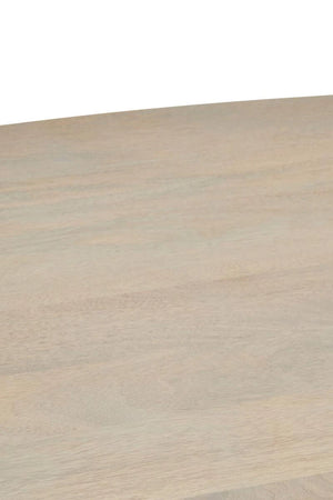 Close-up of the grey-washed mango wood grain on the top of the Hawthorn Grey Oval Dining Table.