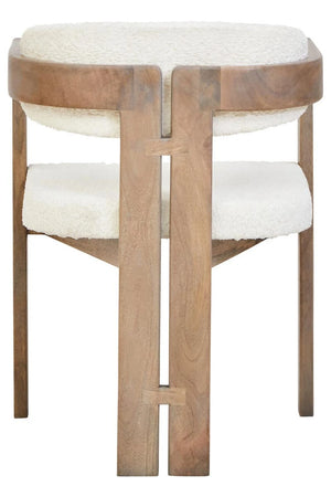 Back view of the Hawthorn Grey Dining Chair, showing the sculptural split back leg and joinery detail.