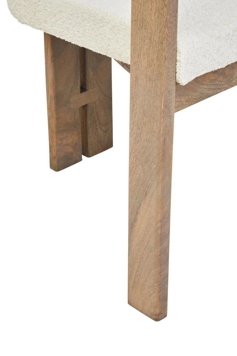 Close-up of the grey-washed mango wood legs of the Hawthorn Grey Dining Chair.