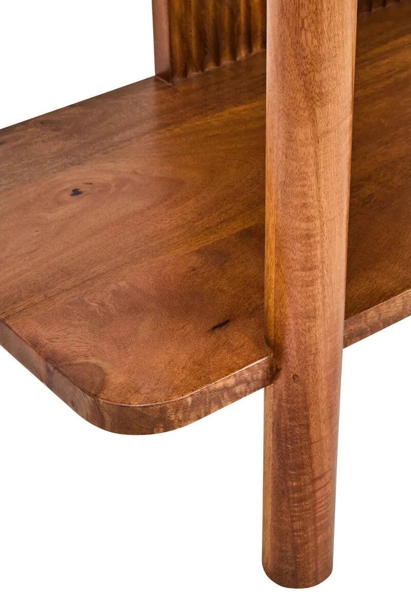 Close-up of a rounded mango wood shelf corner and round post on the Hawthorn Five Tier Shelf Unit.