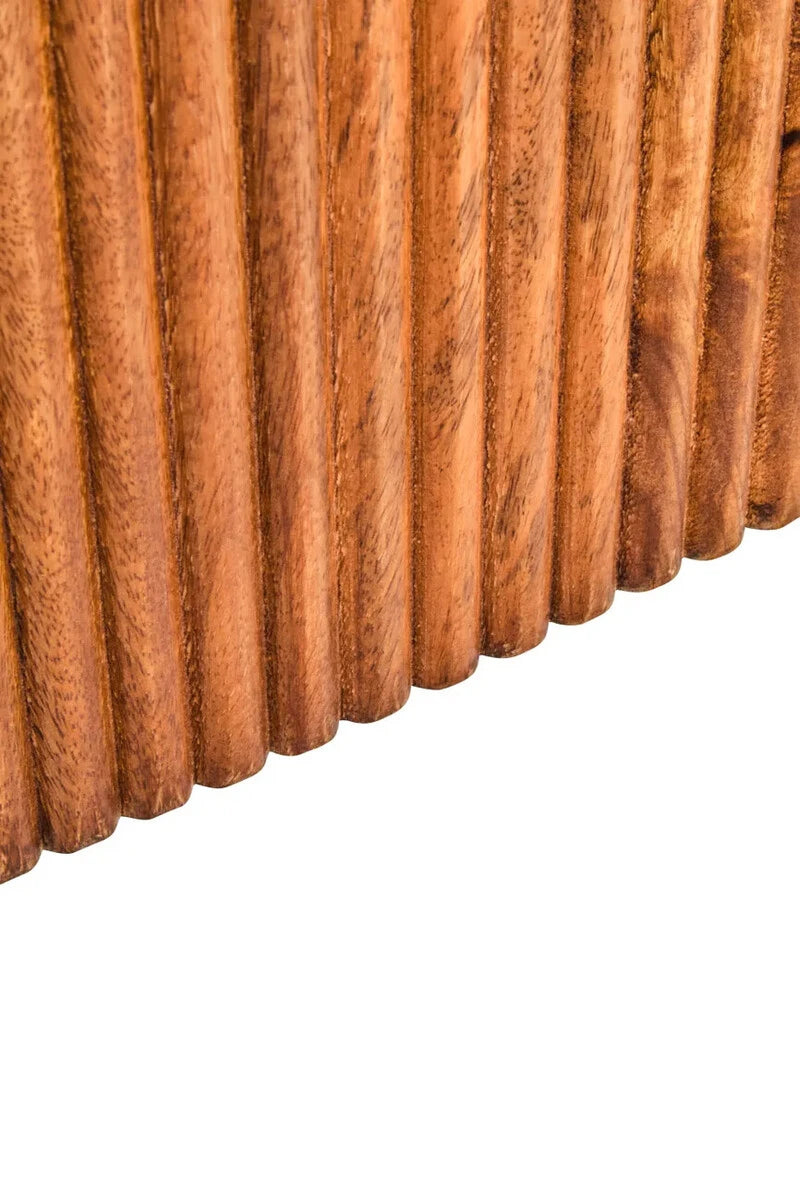 Close-up of the vertical reeding on the Hawthorn Mango Wood Oval Dining Table base.